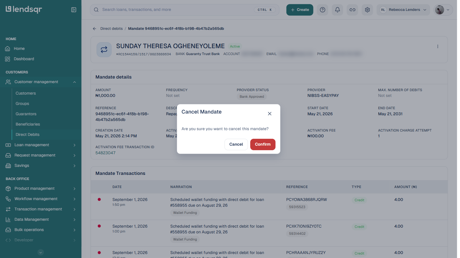 Cancel Mandate confirmation dialog over the mandate detail page, borrower details blurred with a CSS blur matching the dimmed backdrop