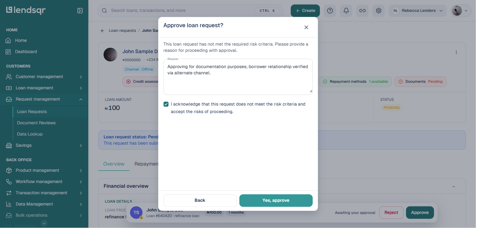 Approve loan request dialog asking for a reason for proceeding despite unmet risk criteria, with a reason text field boxed in red and the acknowledgement checkbox ticked